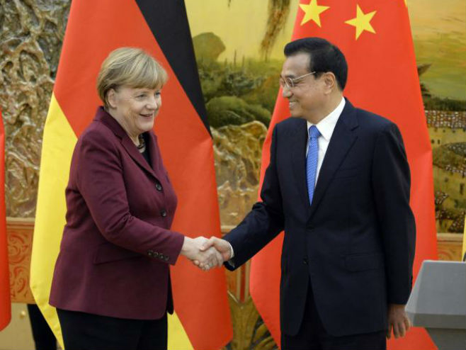 Merkel i Li - Foto: AP